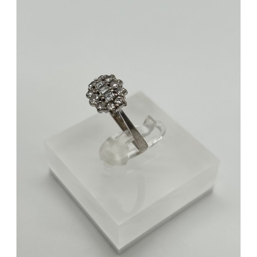 45 - 18ct white gold diamond cluster ring, size M 1/2, [3.30g]