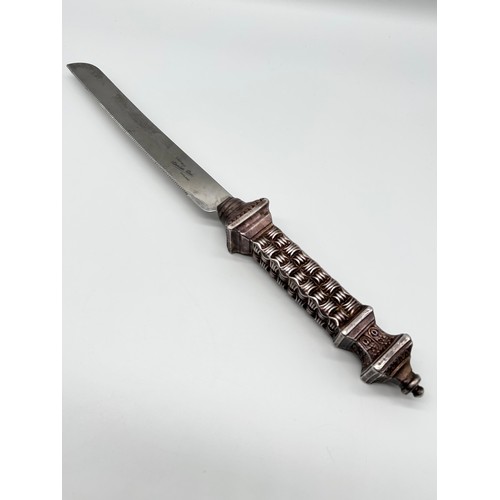 44 - Sheffield stainless steel carving knife with marked 925 silver handle