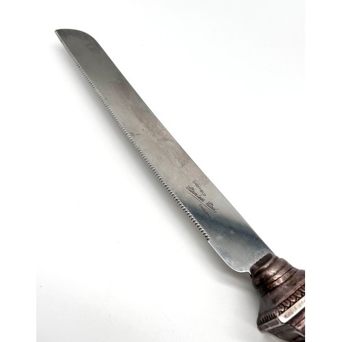 44 - Sheffield stainless steel carving knife with marked 925 silver handle