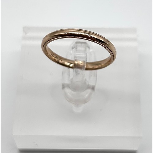 33 - 14ct gold wedding band, size L [2.17g]