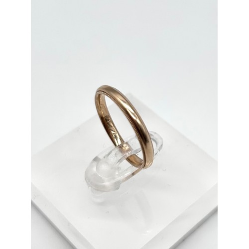 33 - 14ct gold wedding band, size L [2.17g]