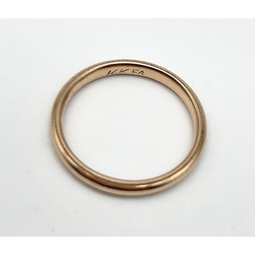 33 - 14ct gold wedding band, size L [2.17g]