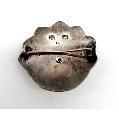 1 - Georg Jensen - A rare silver and cabochon garnet set brooch, no 64, 836, as a stylised flower head, ... 