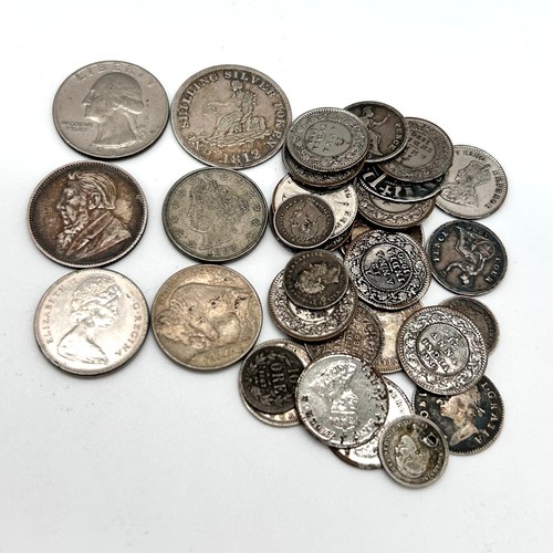 12 - A miscellaneous small group of all world silver coins including hammered silver penny, 2 x four penc... 