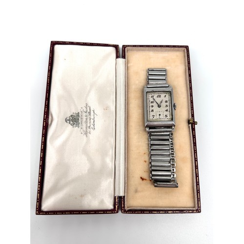 19 - International Watch Company - an Art Deco period wristwatch, rectangular dial Arabic numerals, subsi... 