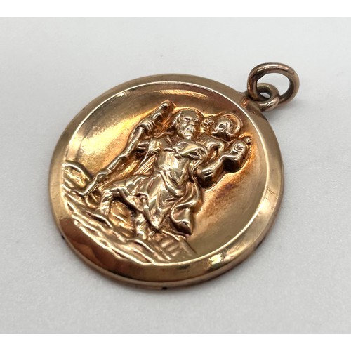 11 - 9ct Gold St Christopher pendant 

Weight - 3.28g