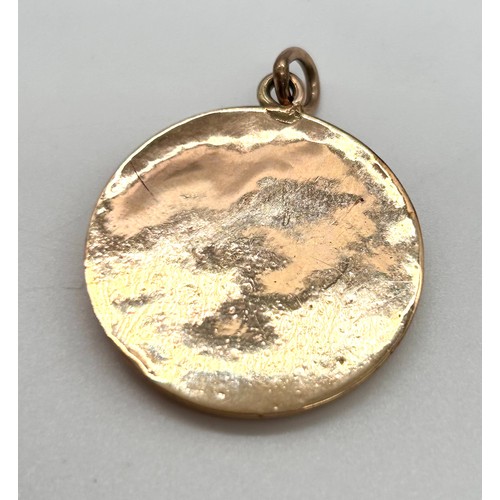 11 - 9ct Gold St Christopher pendant 

Weight - 3.28g