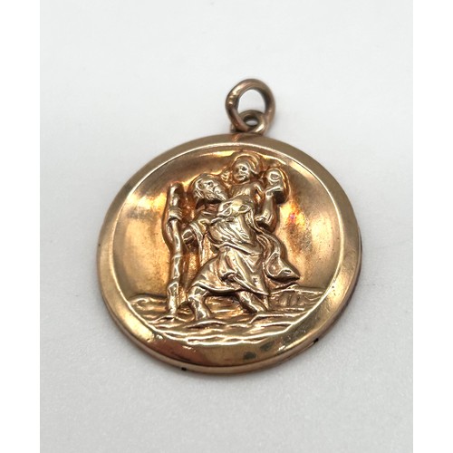 11 - 9ct Gold St Christopher pendant 

Weight - 3.28g