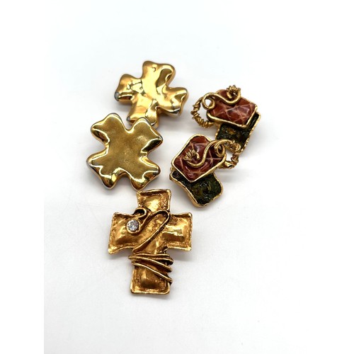 50 - Christian Lacroix gold tone necklace, cross pin brooch and two pairs of Christian Lacroix clip on ea... 