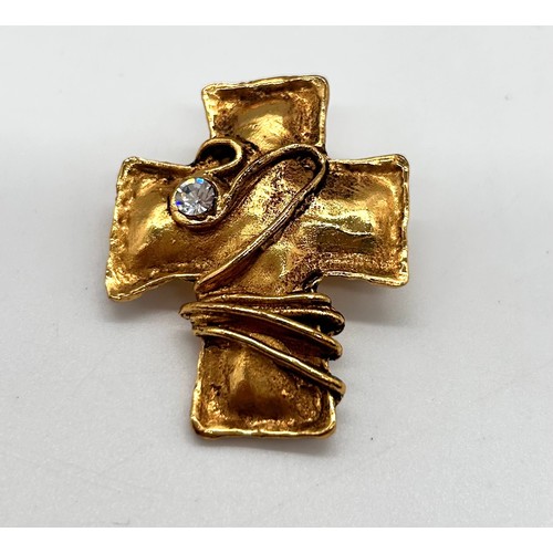 50 - Christian Lacroix gold tone necklace, cross pin brooch and two pairs of Christian Lacroix clip on ea... 