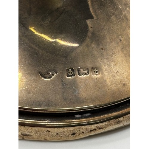 79 - Pair of silver candlesticks, Birmingham 1918 (Weighted) and a silver photo frame, Francis Howard Ltd... 