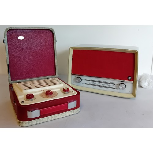 224 - 1950's Ever Ready Sky Baby portable valve radio together with a vintage Pye radio (model 1113- in wo... 