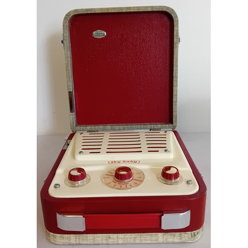 224 - 1950's Ever Ready Sky Baby portable valve radio together with a vintage Pye radio (model 1113- in wo... 