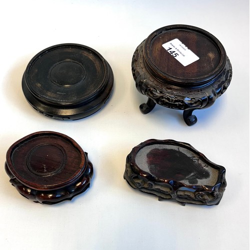 145 - Collection of four chinese hardwood stands