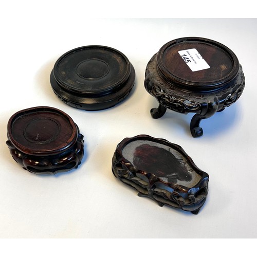 145 - Collection of four chinese hardwood stands