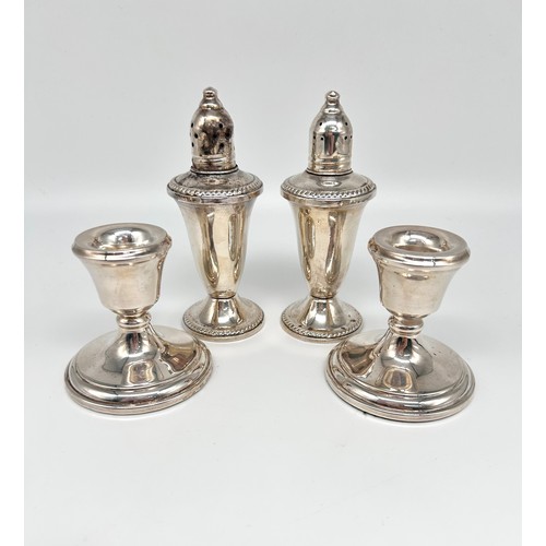 98 - Pair of Duchin Creations weighted silver salt and pepper shakers and a pair of filled silver candles... 