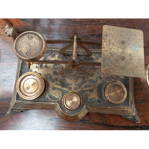 415 - Collection of brassware to include 1917 large ammunition shell, two end cases and a set of ornate sc... 