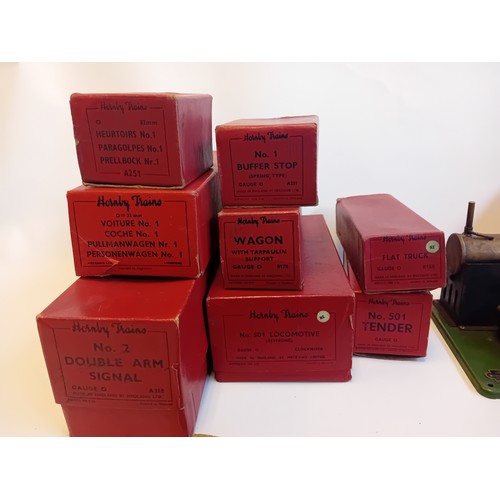 334 - Large collection of vintage Hornby Railway track, flat trunk, Brake vans, wagons, arm signal, locomo... 