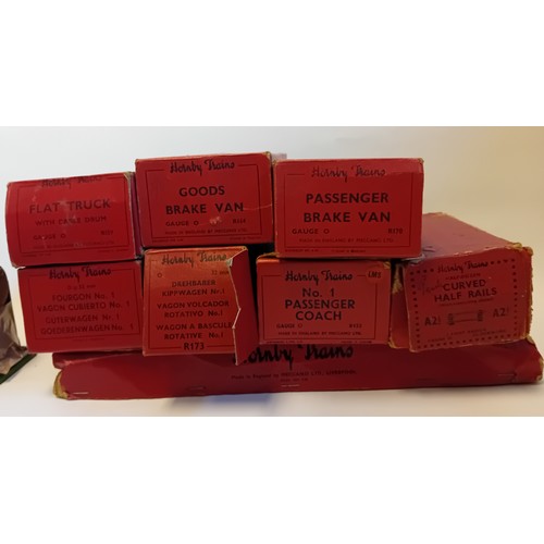 334 - Large collection of vintage Hornby Railway track, flat trunk, Brake vans, wagons, arm signal, locomo... 