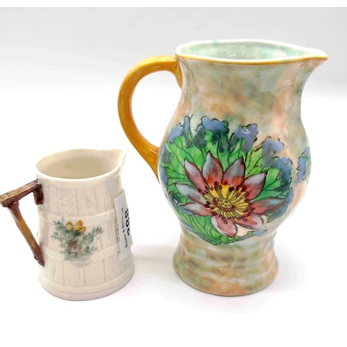 395 - Royal Worcester - a small jug decorated with a Chaffinch on white staved body, branch form handle, g... 