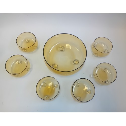 396 - Vintage amber glass footed bowl with six smaller