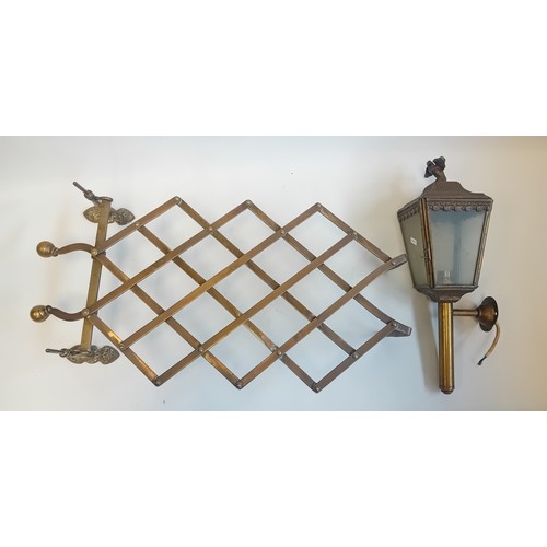 289 - Antique brass campaign folding portable trivet together with brass horse coach lamp featuring eagle ... 