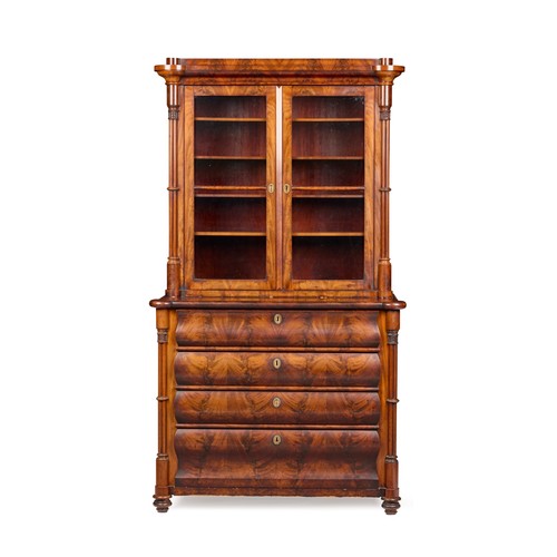 422 - Danish Mahogany bookcase on chest, the upper part with a pair of glazed doors enclosing shelves flan... 