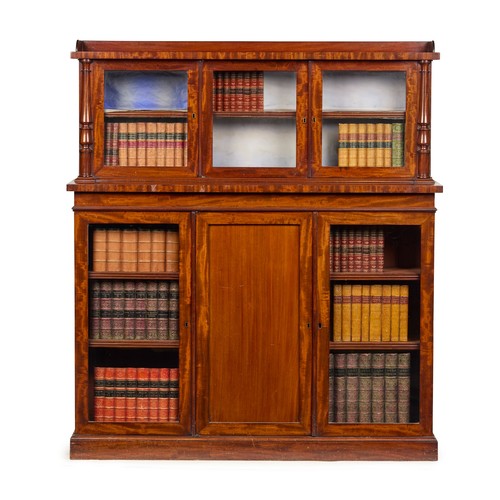 425 - A Victorian mahogany bookcase cabinet, by John Reid & sons, The superstructure with a gallery and gl... 