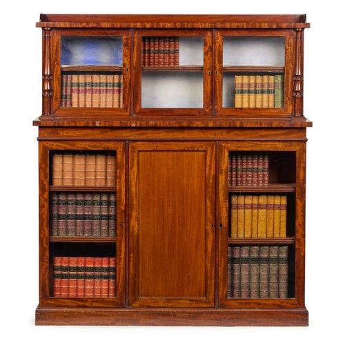 425 - A Victorian mahogany bookcase cabinet, by John Reid & sons, The superstructure with a gallery and gl... 