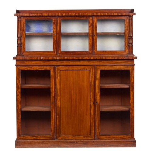 425 - A Victorian mahogany bookcase cabinet, by John Reid & sons, The superstructure with a gallery and gl... 