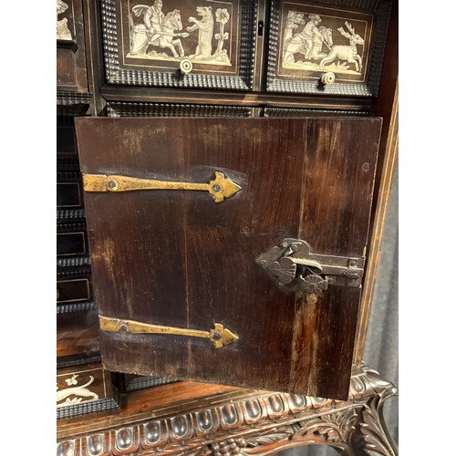 423 - 17th century, Rosewood cabinet on later stand, of eight drawers & cupboards enclosing small drawers ... 