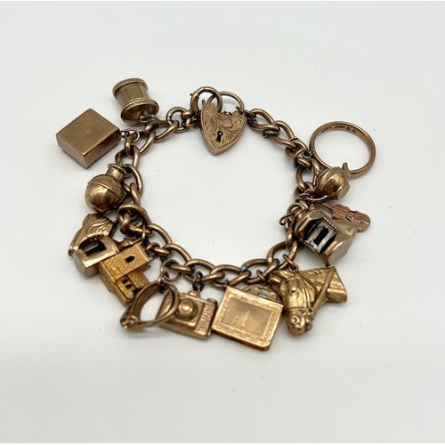 17 - 9ct Gold Charm Bracelet with 16 Charms 
Weight - 40.32g
