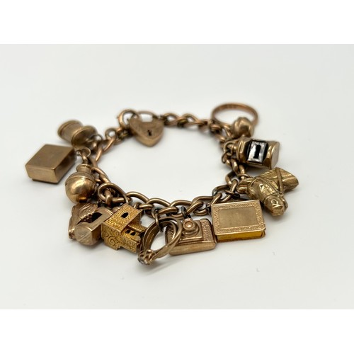 17 - 9ct Gold Charm Bracelet with 16 Charms 
Weight - 40.32g