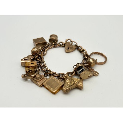 17 - 9ct Gold Charm Bracelet with 16 Charms 
Weight - 40.32g