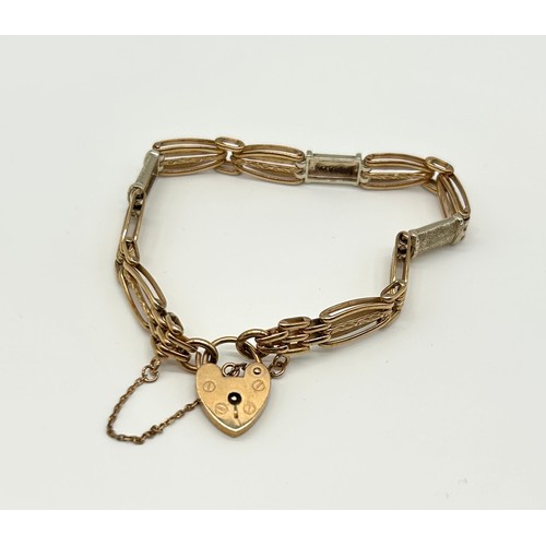 19 - 9ct Gold Bracelet with Heart Shaped Clasp 
Weight - 13.86g