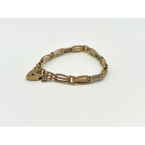19 - 9ct Gold Bracelet with Heart Shaped Clasp 
Weight - 13.86g
