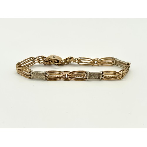 19 - 9ct Gold Bracelet with Heart Shaped Clasp 
Weight - 13.86g