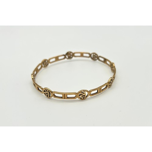 20 - 9ct Gold McIntosh style Bangle 
Weight - 14.35g