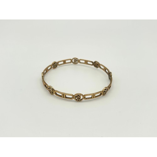 20 - 9ct Gold McIntosh style Bangle 
Weight - 14.35g