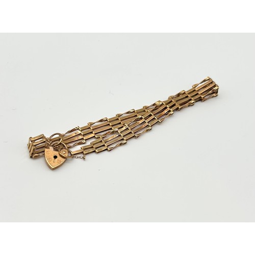 21 - 9ct Gold Bar Gate Bracelet wit Heart Shaped Clasp 
Weight - 5g