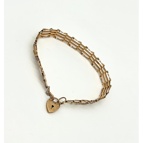 21 - 9ct Gold Bar Gate Bracelet wit Heart Shaped Clasp 
Weight - 5g