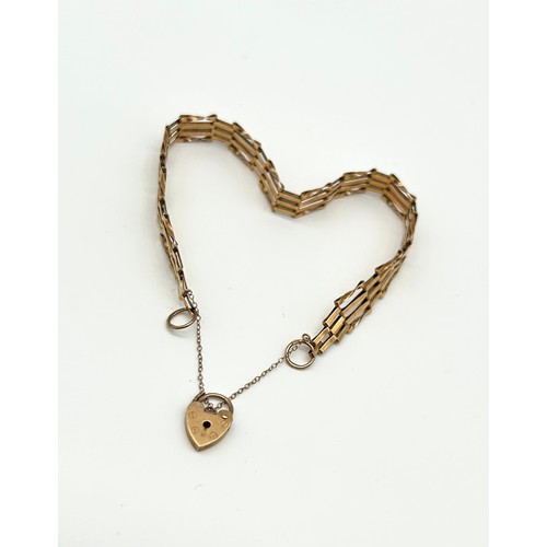 21 - 9ct Gold Bar Gate Bracelet wit Heart Shaped Clasp 
Weight - 5g