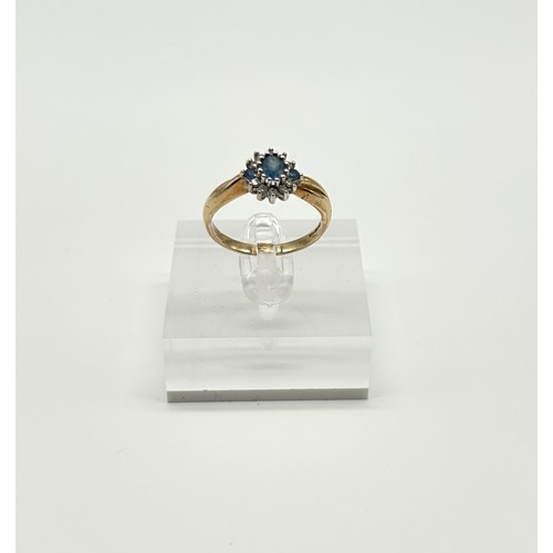 25 - 9ct Gold blue sapphire and Diamond Ring 
Size - R
Weight - 3.12g
