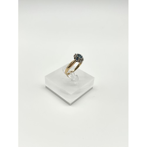 25 - 9ct Gold blue sapphire and Diamond Ring 
Size - R
Weight - 3.12g