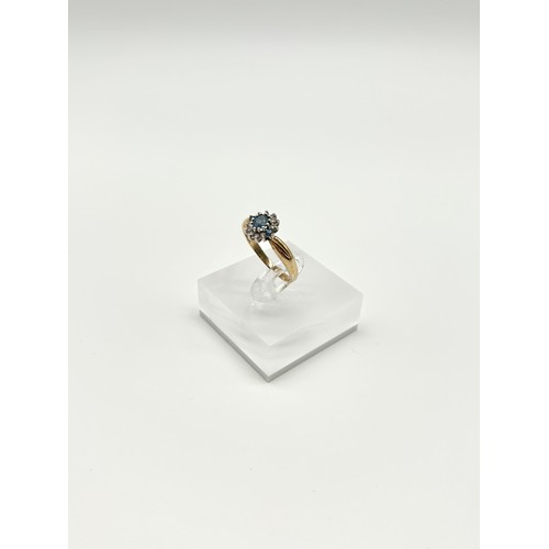 25 - 9ct Gold blue sapphire and Diamond Ring 
Size - R
Weight - 3.12g