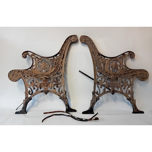 354 - Pair of Victorian salvage cast iron bench ends featuring lion heads and ornate scrollwork design