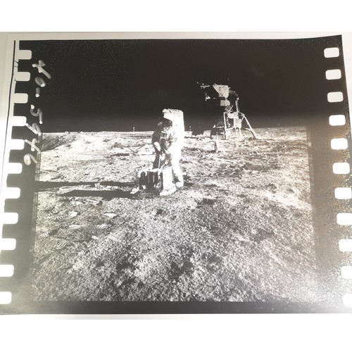40A - NASA PHOTO'S TAKEN BY NEIL ARMSTRONG, A PAIR SEQUENTIAL PHOTOGRAPHS DEPICTING BUZZ ALDRIN DEPLOYING ... 