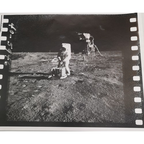 40A - NASA PHOTO'S TAKEN BY NEIL ARMSTRONG, A PAIR SEQUENTIAL PHOTOGRAPHS DEPICTING BUZZ ALDRIN DEPLOYING ... 
