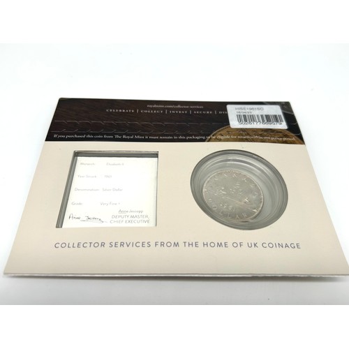 54 - The Royal Mint Collector Services a Genuine Historic Coin 1961 Silver Canada Dollar, featuring the f... 