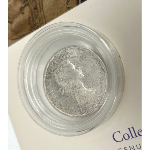 54 - The Royal Mint Collector Services a Genuine Historic Coin 1961 Silver Canada Dollar, featuring the f... 